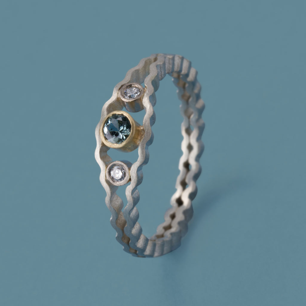 Blue stone online eternity rings